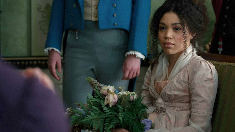 Marina Thompson holding flowers