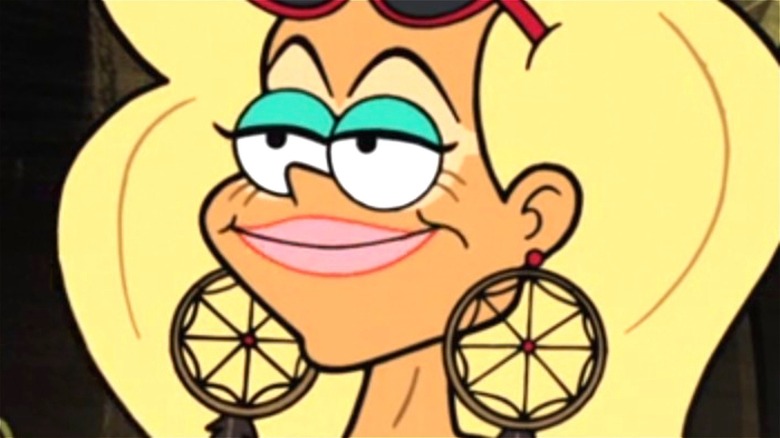 Darlene smiling with web earrings