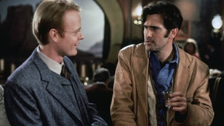 Socrates and Brisco share a drink in the saloon in "The Adventures of Brisco County Jr."