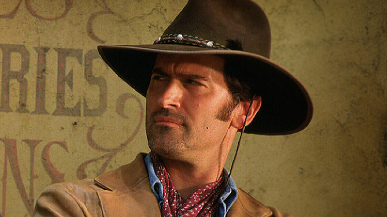 Brisco County Jr. looks at someone with suspicion in 
