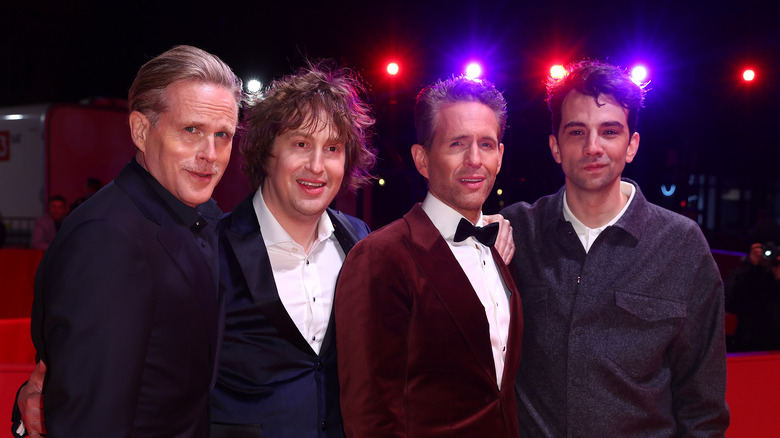 Cary Elwes, Matt Johnson, Glenn Howerton, Jay Baruchel smiling on the red carpet