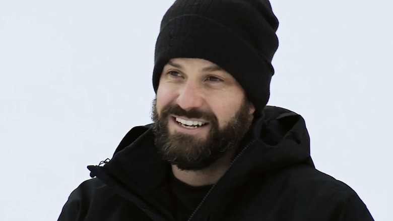 Johnny Bananas smiling on a mountain