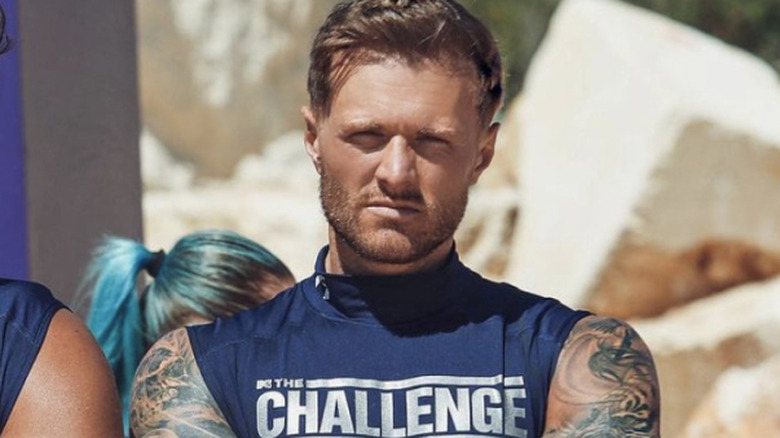 Kyle posing on set of The Challenge