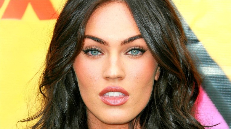 Megan Fox looking into camera 