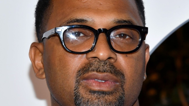Mike Epps wearing glasses