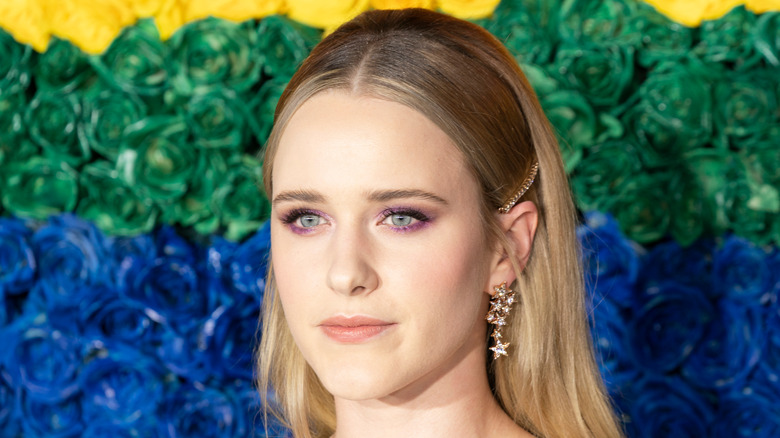 Rachel Brosnahan against colorful background 