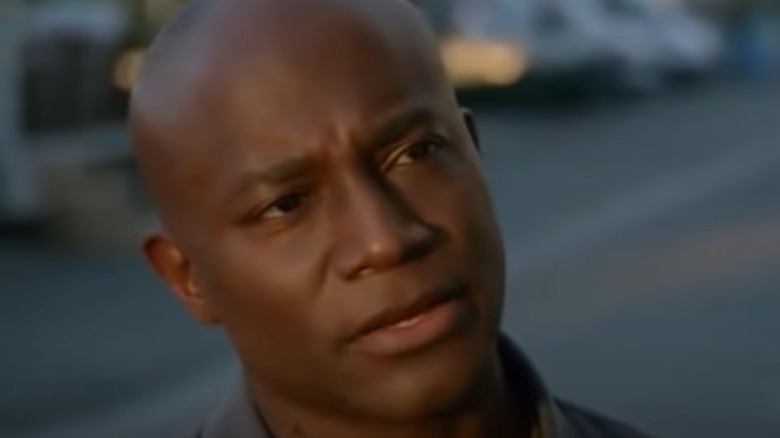 Taye Diggs grimacing