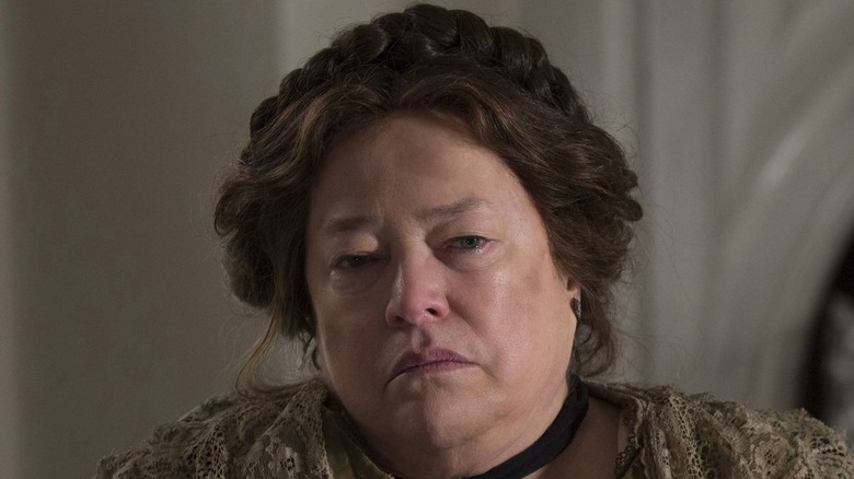 Kathy Bates looking dour