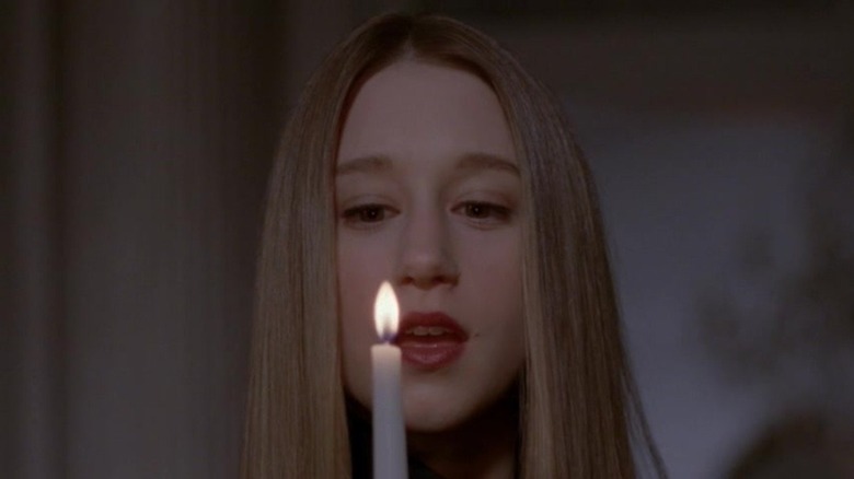 Taissa Farmiga with candle