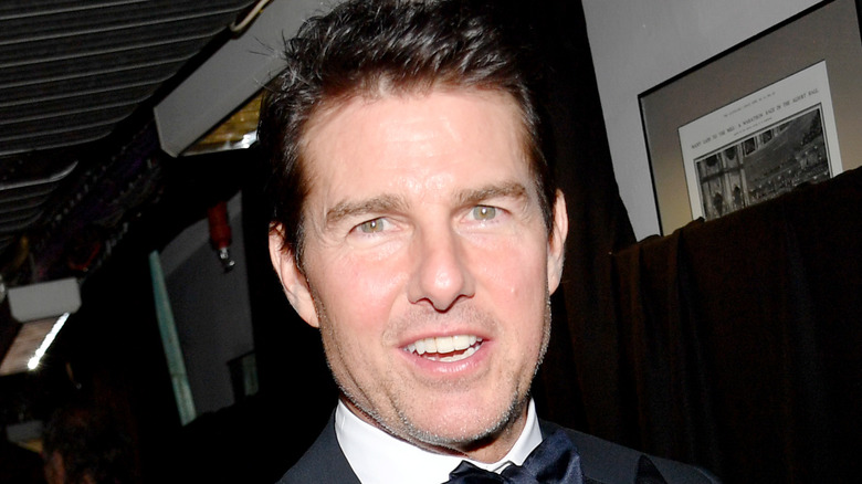 Tom Cruise smirking