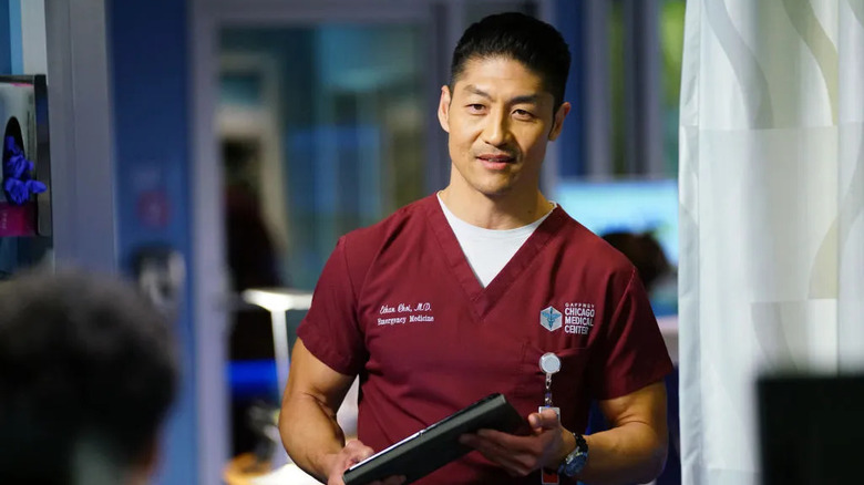 Dr. Ethan Choi holds a chart