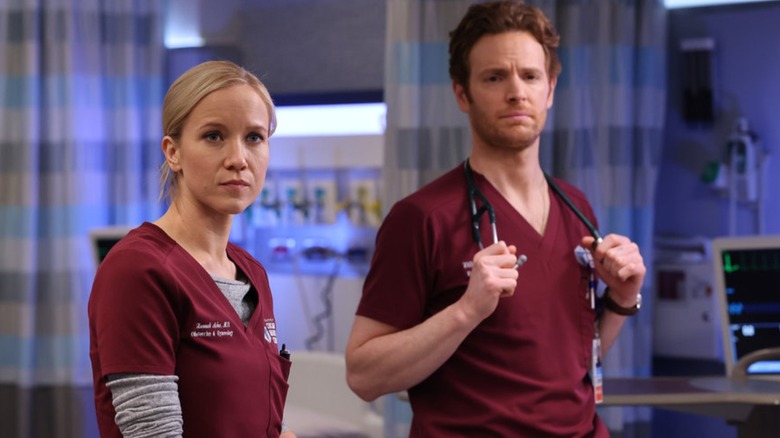 Jessy Schram and Nick Gehlfuss in hospital uniforms