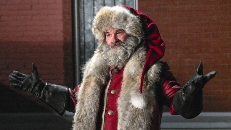 Kurt Russell Santa smiling