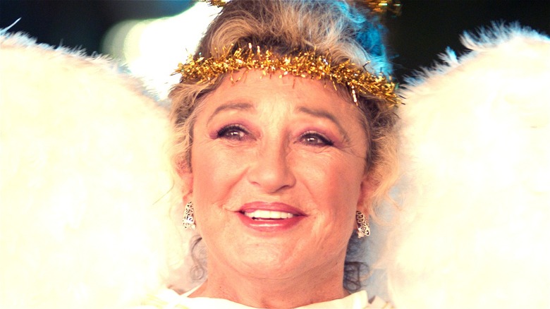 Angelica Maria dressed as Christmas angel