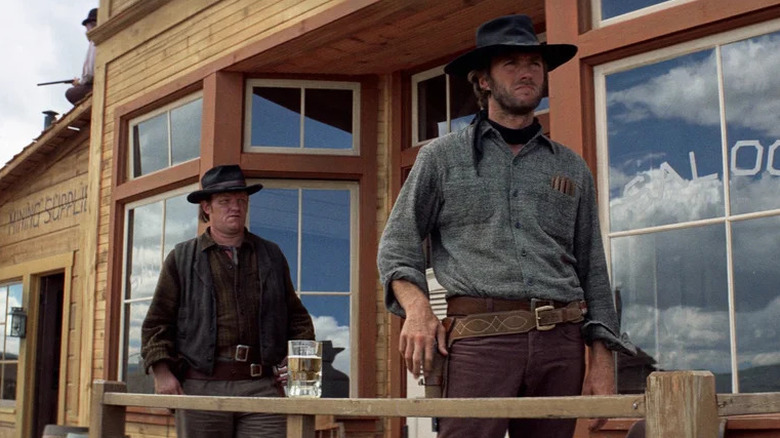 The stranger walks out of the saloon in High Plains Drifter