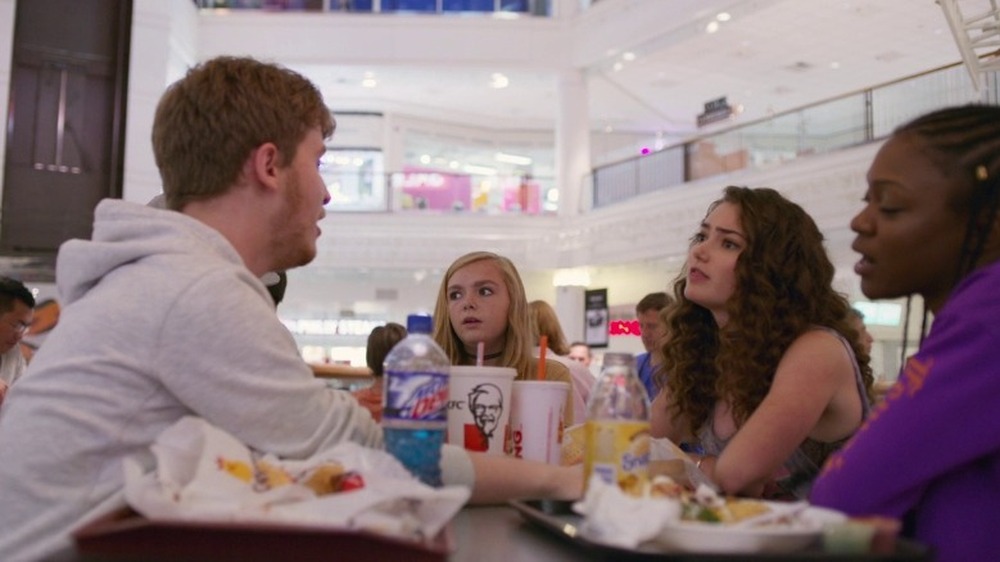 Kayla and friends at mall food court