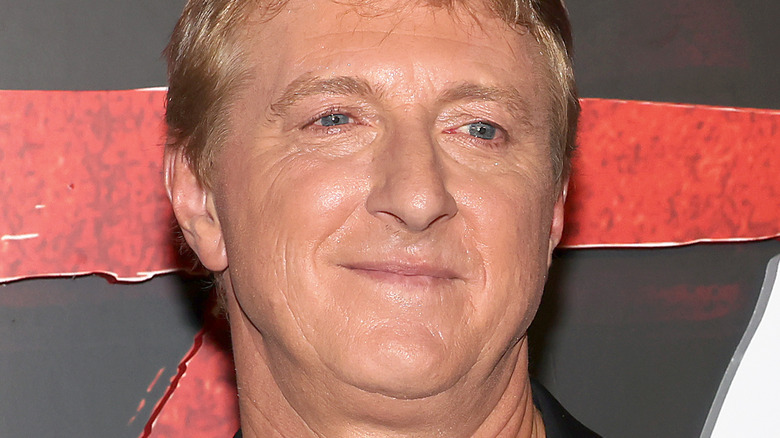 William Zabka smiling