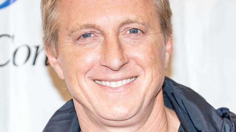 William Zabka smiles