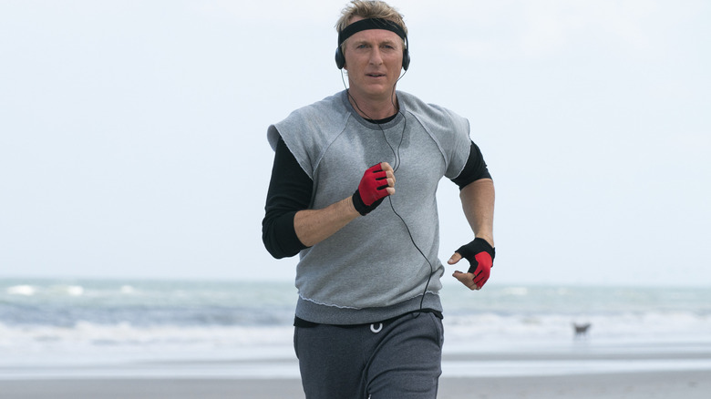 William Zabka as Johnny Lawrence training in Cobra Kai