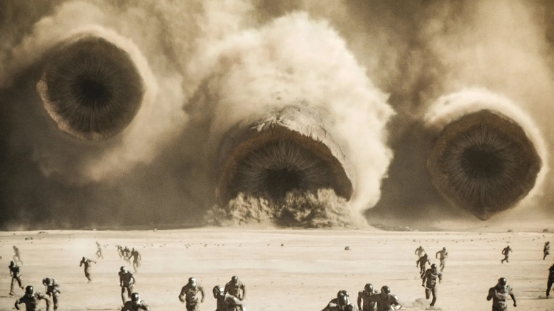 Three worms attack soldiers in "Dune: Part Two" (2024)