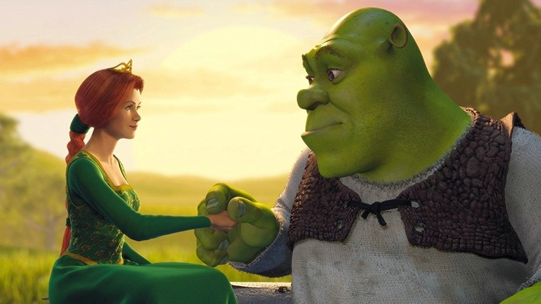 Shrek and Fiona holding hands