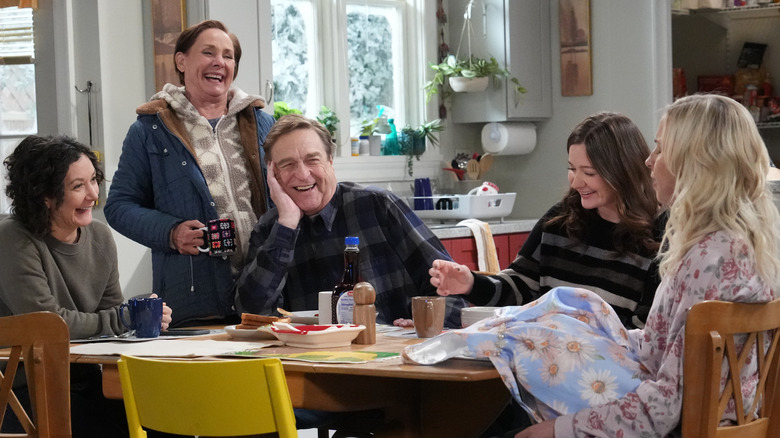 The Conners laughing in kitchen 