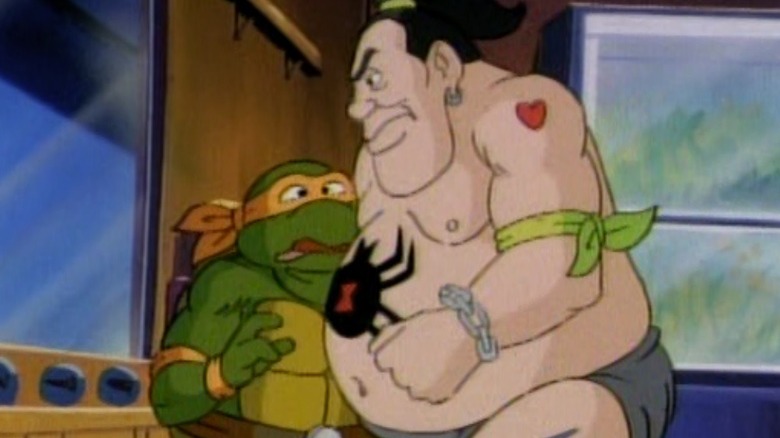 Tattoo squashing Michelangelo