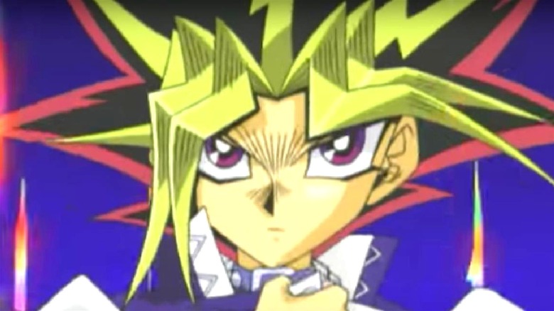 Yugi dueling monsters