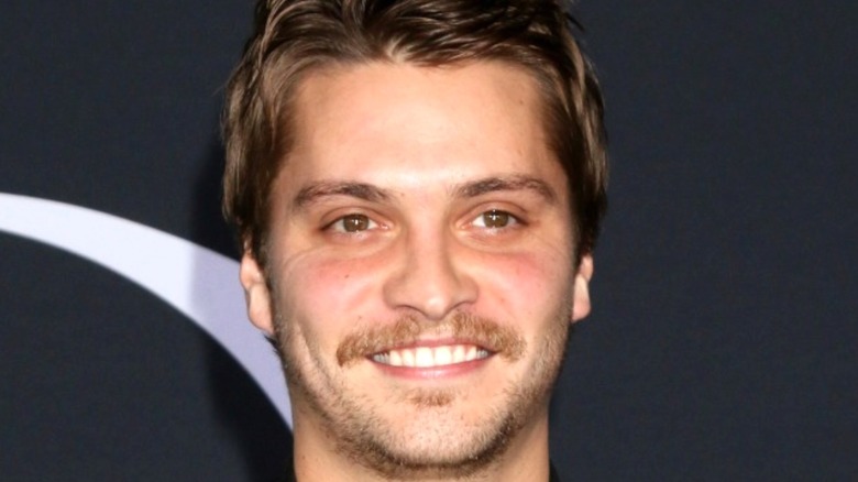 Luke Grimes smiling