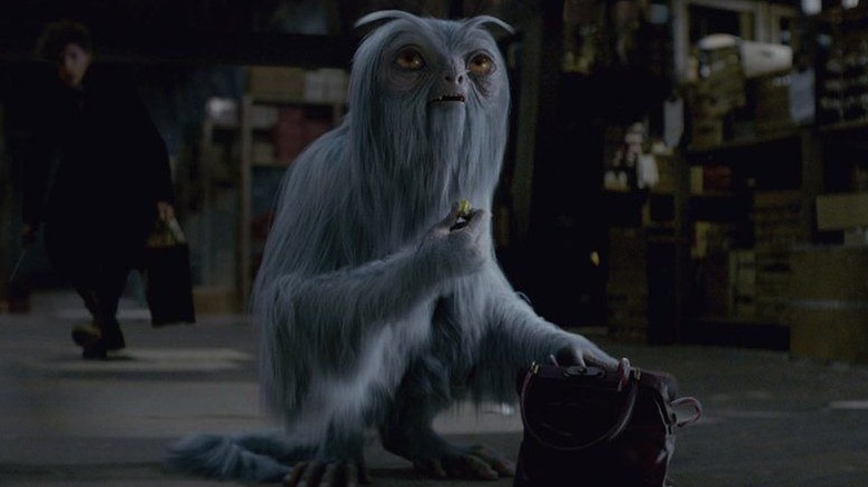 Dougal holding candy out