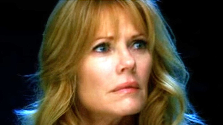 Catherine Willows looking concerned