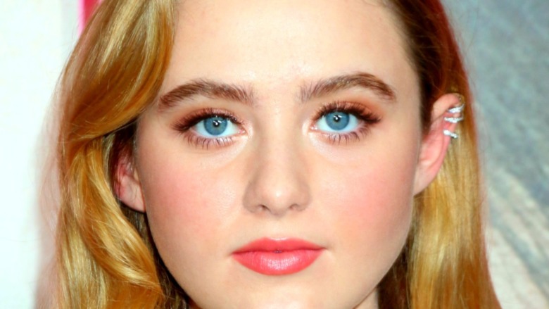 Kathryn Newton posing for shots