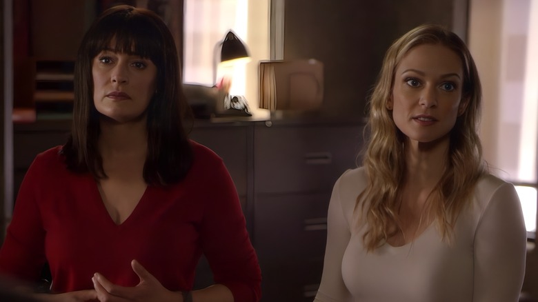 Prentiss and JJ standing together speaking