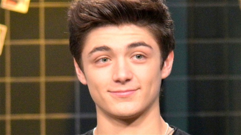 Asher Angel smiling