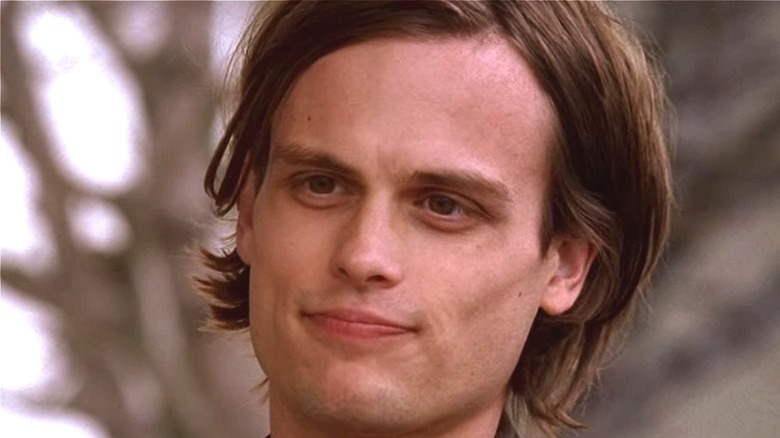 Spencer Reid confused with a half smile