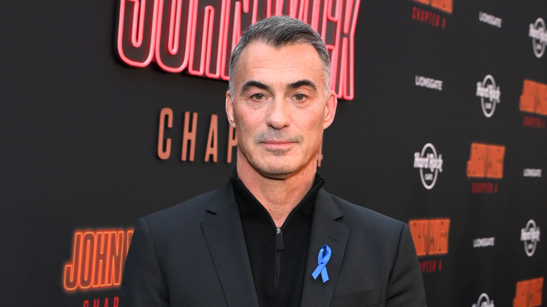 Chad Stahelski posing at John Wick 4 premiere