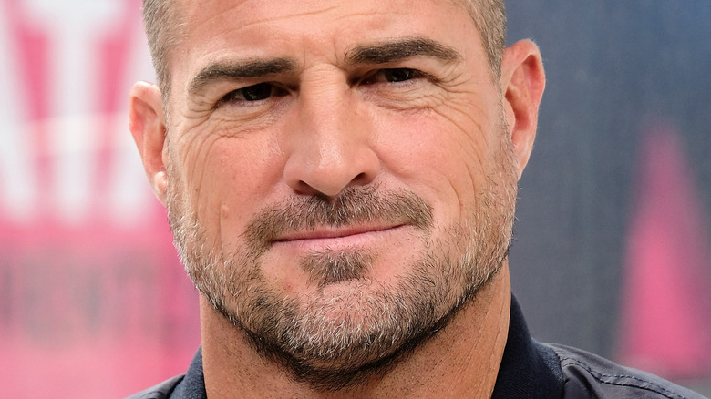 George Eads smirks