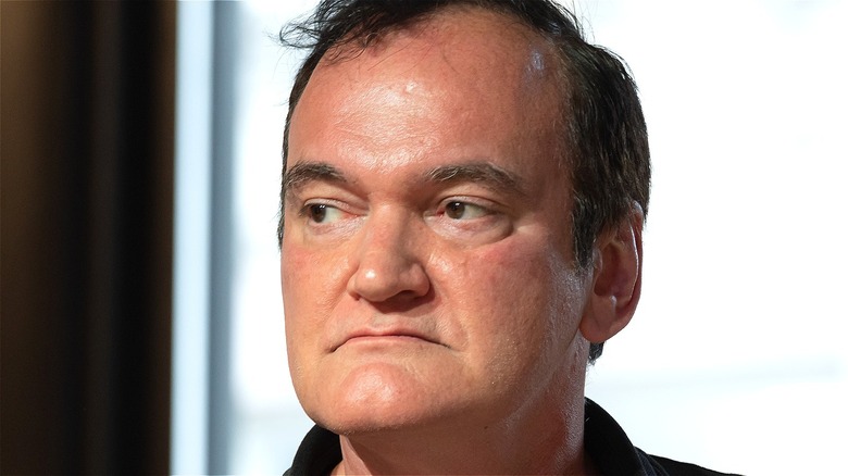 Quentin Tarantino looking grim