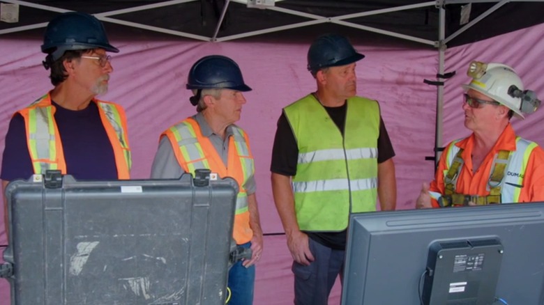 Oak Island team standing around. 