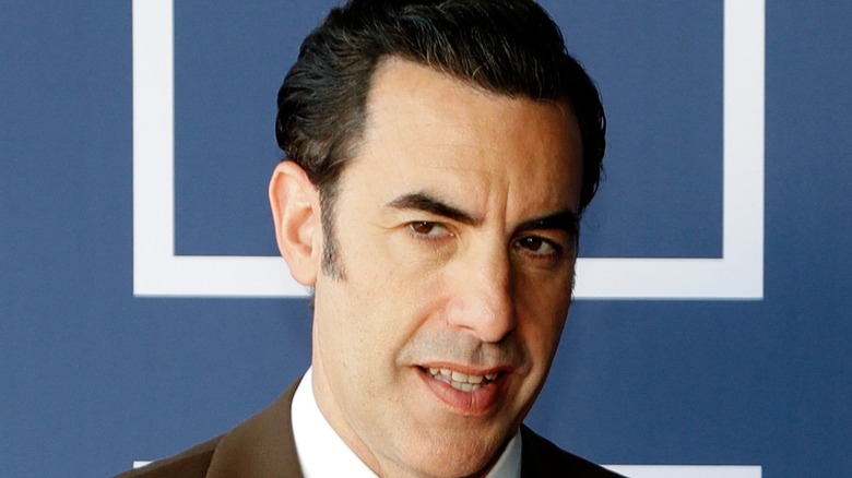 Sacha Baron Cohen looking to side at event