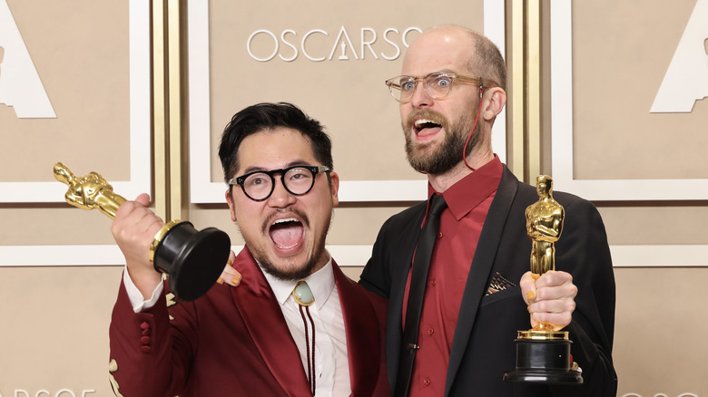 Daniel Kwan and Daniel Scheinert pose with their Oscars