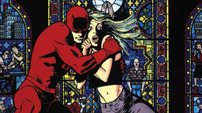 Daredevil holds onto a frightened Karen in front of a stained glass window in "Daredevil: Born Again" tpb cover
