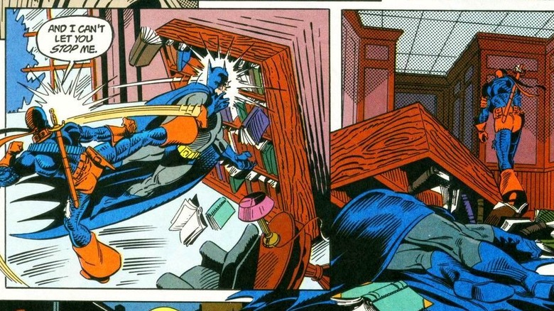 Deathstroke beating up Batman