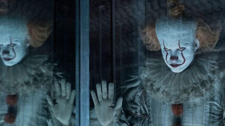 Pennywise behind the glass