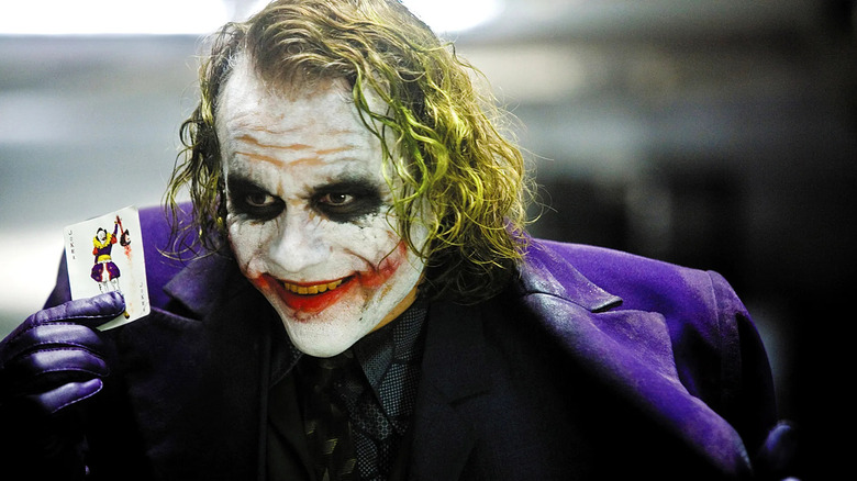 Joker holding joker card