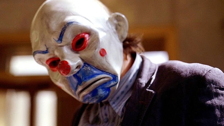 Joker in rubber clown mask