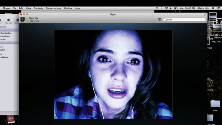 Scared girl on laptop