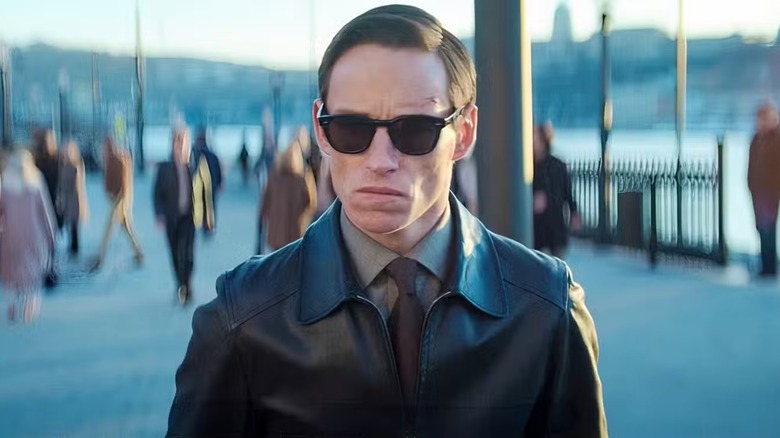 The Jackal wearing sunglasses and a leather jacket in 