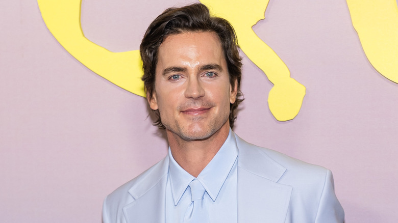 Matt Bomer smiling on the red carpet
