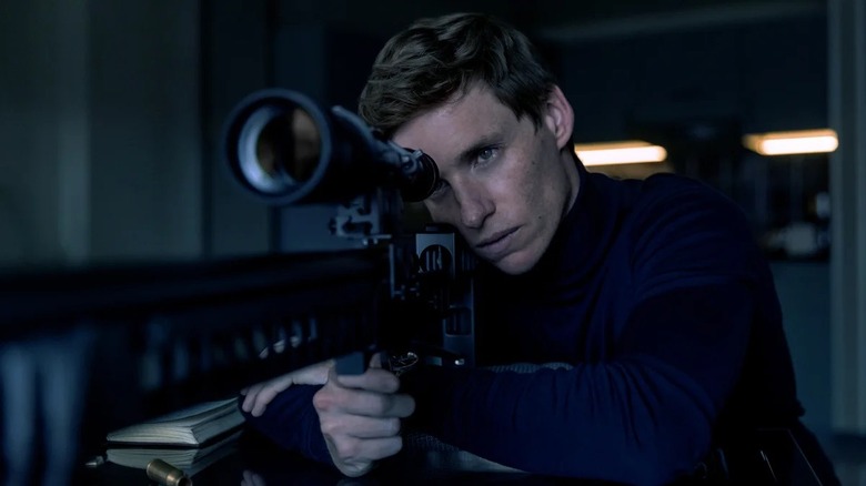 The Jackal aiming a sniper rifle in The Day of the Jackal